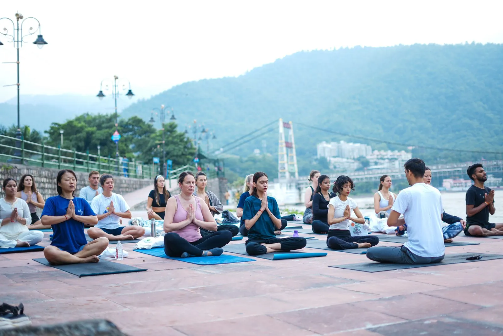 Couples sunrise yoga